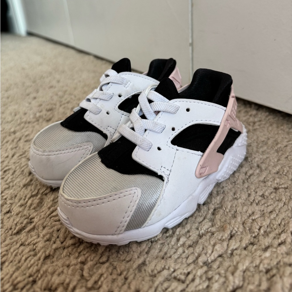 Baby Nike Huarache Run black pink and white sneakers